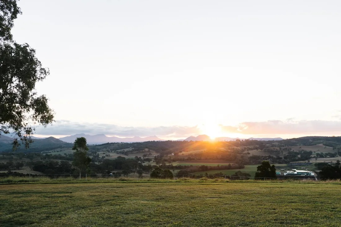 Sunset view across the Scenic Rim landscape from Maroon Hill Estate
